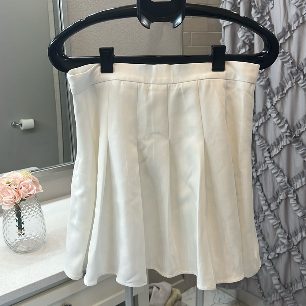 White pleated skirt